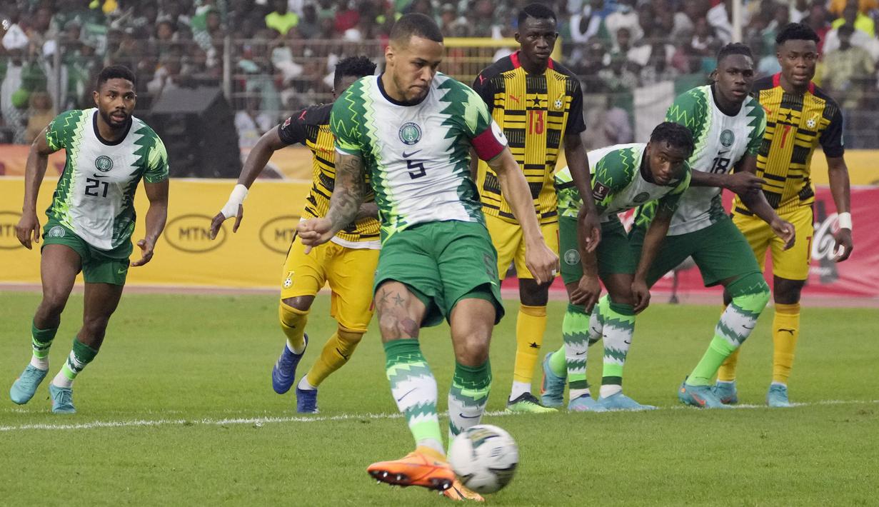 Setelah tertinggal oleh gol Thomas Partey, Nigeria hanya mampu menyamakan skor 1-1 melalui gol penalti William Troost-Ekong hingga laga berakhir. (AP/Sunday Alamba)