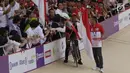 Pebalap sepeda Indonesia, M. Fadli Imammuddin  berselebrasi setelah berhasil juara nomor 4000 meter individual pursuit C4, Jakarta Timur, Jumat (12/10). M. Fadli meraih mendali emas  dengan catatan waktu 5 menit 3.605 detik. (Merdeka.com/Imam Buhori)
