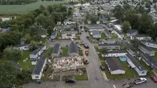 Setidaknya tujuh tornado mendarat di Michigan sebagai bagian dari badai hebat yang dipicu oleh angin kencang. (Andy Morrison/Detroit News via AP)