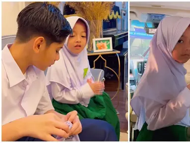 Potret kebersamaan King Faaz dan Queen Eijaz sebelum berangkat sekolah. Kakak adik ini kompak pakai kaus kaki bareng dan sempatkan bermain puzzle sebentar sebelum ke sekolah. Lantaran baru hari pertama, King Faaz dan Queen Eijaz diantar oleh kedua orang tuanya. Tak hanya Faaz dan Eijaz, Fairuz A Rafiq dan Sonny Septian juga antusias di hari pertama anak sekolah. (Liputan6.com/IG/@fairuzarafiq)