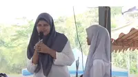 Aisyah, santri asal Malaysia yang berdialog dengan Gus Iqdam (SS: YT Preman Dua Alam)