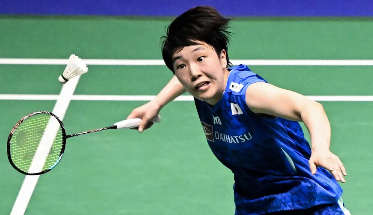 Gregoria sebenarnya berpeluang memenangkan pertandingan. Sebab, di game pertama dia sudah unggul 15-12. Namun, Akane mampu membalikkan keunggulan menjadi 18-15. (Peter PARKS/AFP)