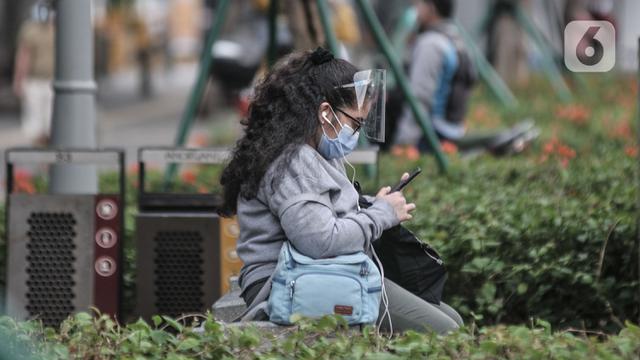 FOTO: Pembatasan 25 Persen Pekerja Kantoran di Jakarta