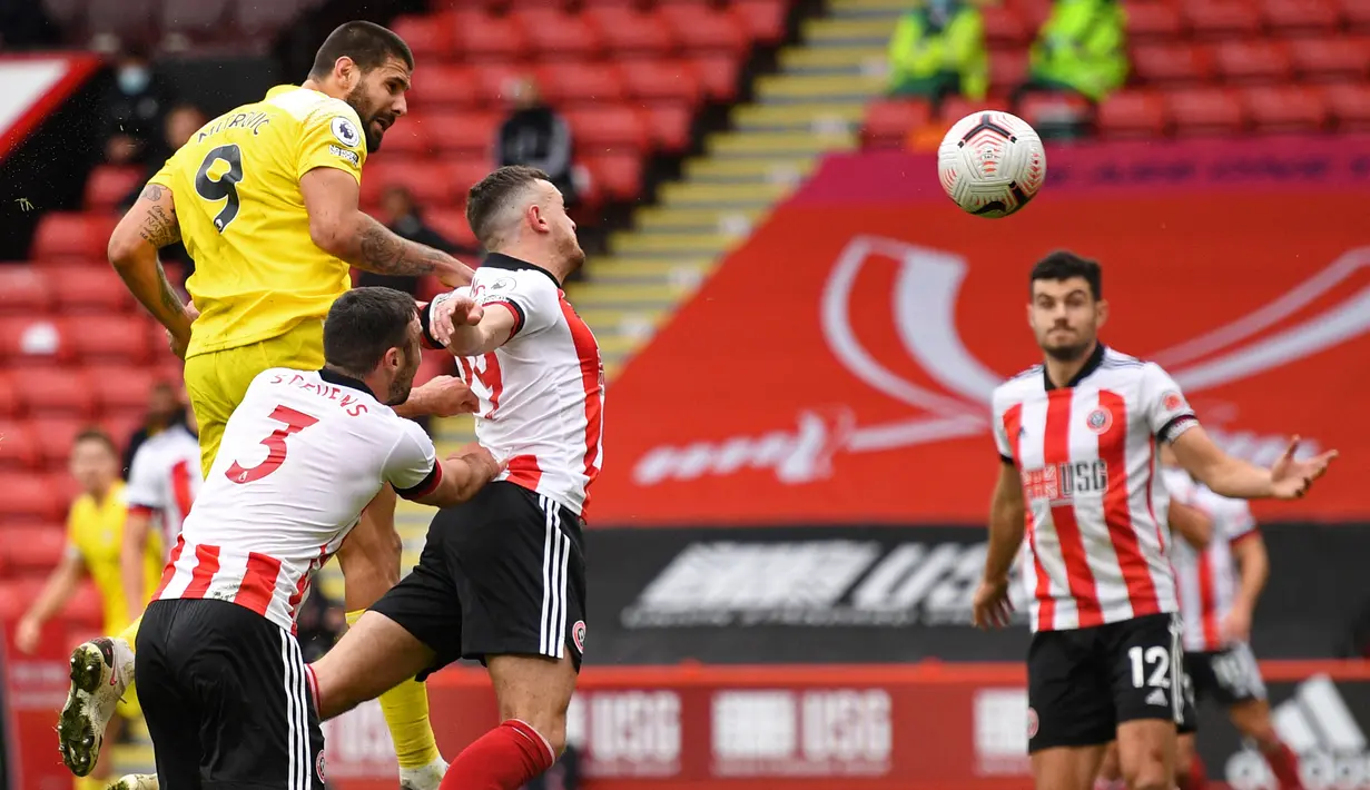Pemain yang telah memperkuat Fulham selama 5 musim, dimana satu musim pertama masih berstatus pinjaman dari Newcastle United ini tampil tajam musim ini di divisi Championship. (AFP/Pool/Oli Scarff)