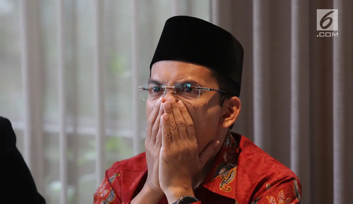 Ekspresi mantanGubernur NTB, Tuan Guru Bajang (TGB) Muhammad Zainul Majdi saat konferensi pers klarifikasi pemberitaan di Jakarta, Rabu (19/9). TGB diduga menerima aliran dana divestasi PT Newmont Nusa Tenggara periode 2009-2013. (Merdeka.com/Imam Buhori)
