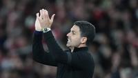 Wajah bahagia terpancar dari Mikel Arteta setelah Arsenal berhasil meraih kemenangan penting saat menjamu Burnley dalam lanjutan Premier League 2025/2026. Bermain di Emirates Stadium, Selasa (19/5/2026) dini hari WIB, The Gunners menang tipis 1-0 lewat gol Kai Havertz. (AP Photo/Kirsty Wigglesworth)