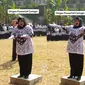Seorang wanita yang jadi dirigen paduan suara di Caringin viral di media sosial TikTok. Bawakan lagu-lagu Nasional Indonesia dengan penuh semangat dan buat warganet terbawa ingin ikut bernyanyi. (Sumber: TikTok @hamdan_fyp)