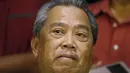 Ekspresi wajah mantan Wakil PM, Muhyiddin Yassin saat diwawancarai awak media di Kuala Lumpur , Malaysia, Rabu (29/7/2015). PM Malaysia Najib Razak memecat wakilnya, Muhyiddin Yassin dalam perombakan kabinet pada 28 Juli 2015. (REUTERS/Olivia Harris)