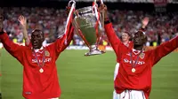 Dwight Yorke dan Andy Cole (manutd.com)