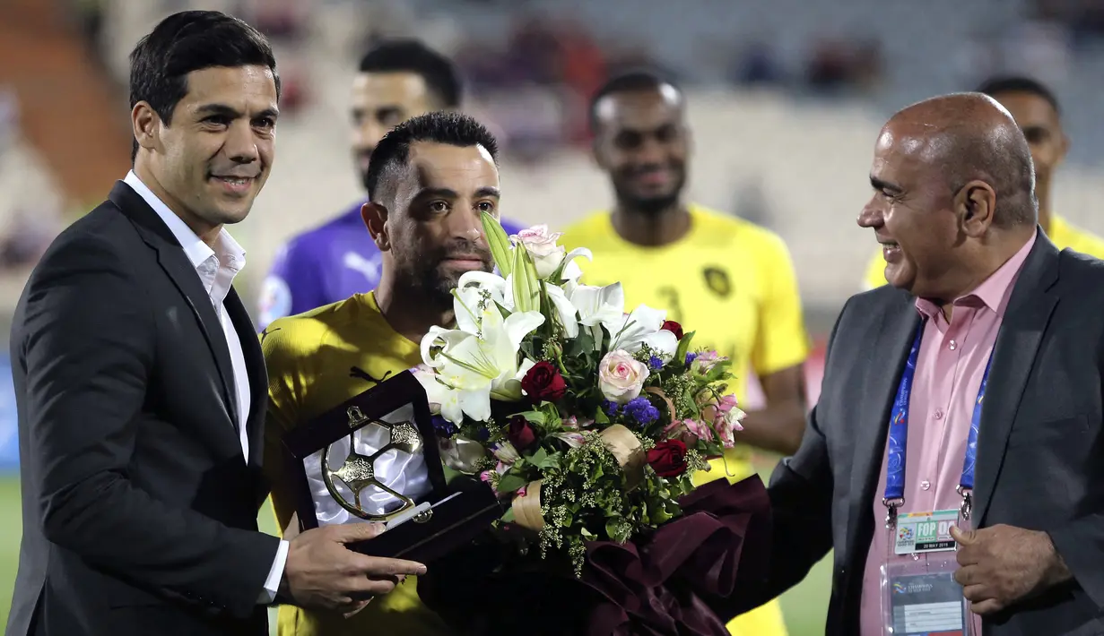 Xavi Hernandez mulai menukangi Al Sadd pada 30 Juni 2019 usai menyatakan pensiun sebagai pemain di klub terakhirnya, Al Sadd. (AFP/Atta Kenare)