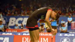 Peraih medali emas SEA Games 2013 di Myanmar itu harus mengakui keunggulan pemain asal Thailand Busanan Ongbumrupan dengan rubber games 21-15, 14-21, 9-21, Jakarta, Rabu (18/6/2014) (Liputan6.com/Miftahul Hayat) 