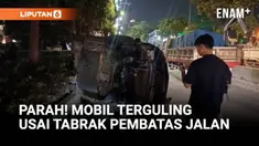 Sebuah mobil jenis SUV berwarna hitam terguling di ruas Jalan S Parman arah Slipi, Palmerah, Jakarta Barat, Kamis (8/1) dini hari.