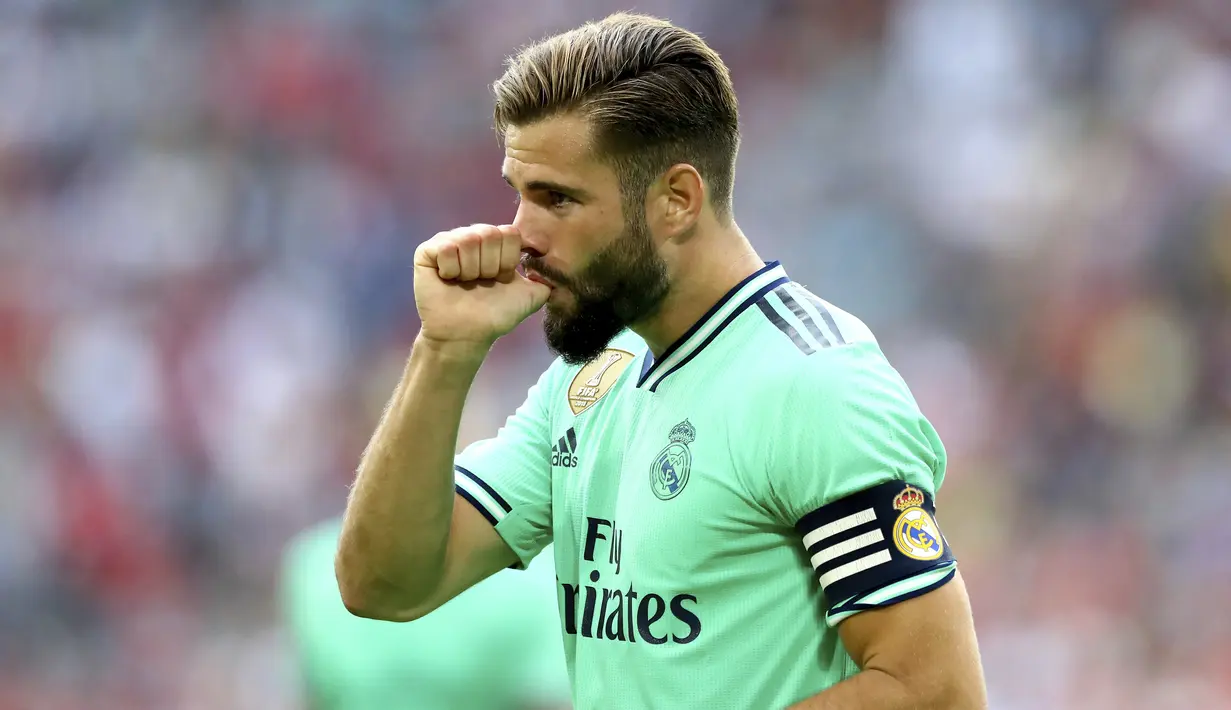Bek Real Madrid, Nacho berselebrasi usai mencetak gol ke gawang Fenerbahce pada pertandingan Audi Cup 2019 di stadion Allianz Arena di Munich, Jerman (31/7/2019). Madrid menempati posisi ketiga di Audi Cup 2019. (AP Photo/Matthias Schrader)