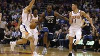 Aksi Devin Booker menjaga Wiggins (AP)