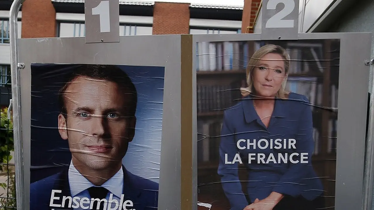 Emmanuel Macron dan Marine Le Pen (AP)