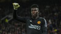 Kiper Manchester United, Andre Onana saat laga pekan pertama Liga Inggris 2023/2024 melawan Wolverhampton di Old Trafford, Manchester, Selasa (15/08/2023) WIB. (AP Photo/Rui Vieira)
