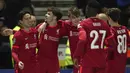 Liverpool memecah kebuntuan di babak kedua dan unggul 1-0 pada menit ke-62. Takumi Minamino (kiri) berhasil membobol gawang Preston lewat sontekannya memanfaatkan umpan silang Neco Williams. (AP/Jon Super)