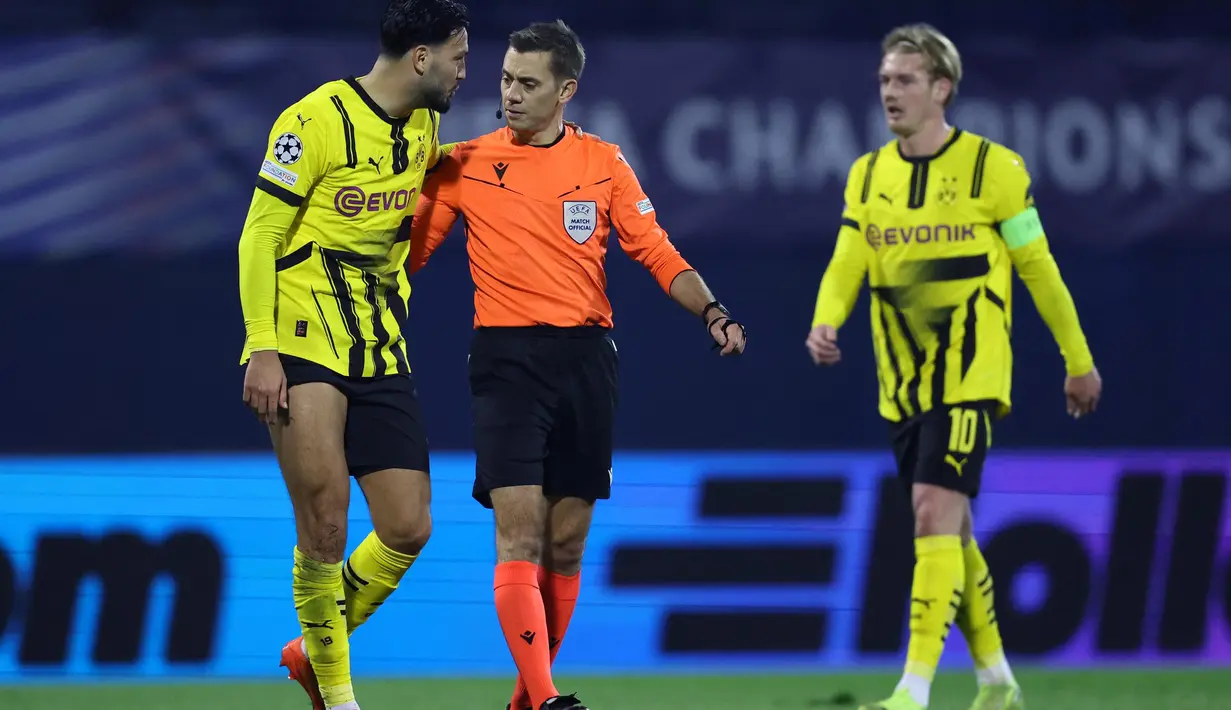 Skor 3-0 untuk Borussia Dortmund tidak berubah hingga akhir pertandingan. Kemenangan ini membuat Die Borussen berada di peringkat keempat klasemen sementara Liga Champions dengan 12 poin dari lima laga. (Damir SENCAR/AFP)