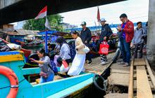 FOTO: Potret Tradisi Mudik Lebaran Naik Perahu dari Cilincing ke Muara Gembong