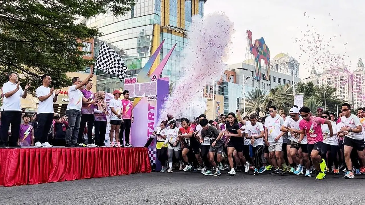 Hendrik Naingolan dan dan Dwi Sagita Juara di MAG Run 2024