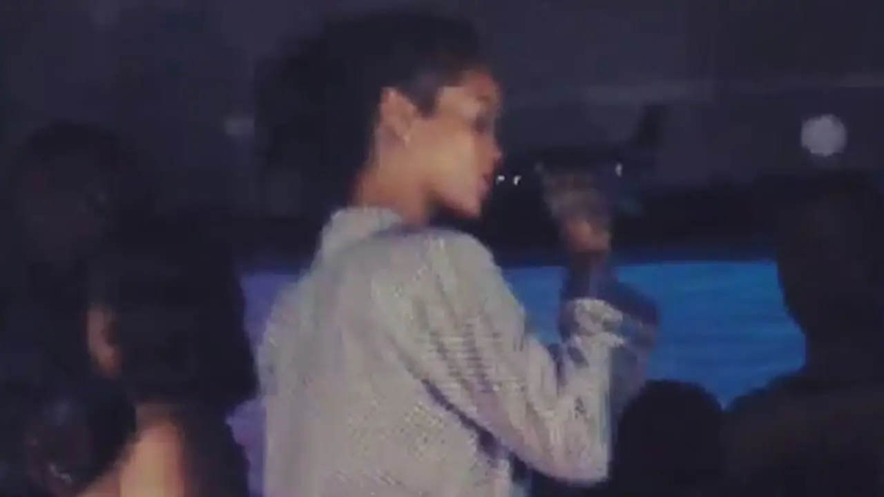 rihanna-drinks-from-shoe-131108b.jpg