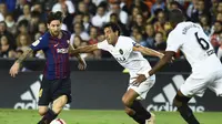 Lionel Messi selamatkan muka Barcelona lawan Valencia (JOSE JORDAN / AFP)