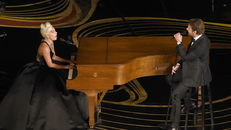 Penampilan Lady Gaga dan Bradley Cooper di Oscar 2019  (Photo by Chris Pizzello/Invision/AP)
