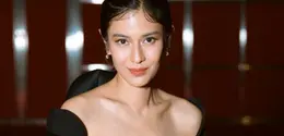Dian Sastrowardoyo mengenakan gaun Wilsen Willim saat closing ceremony Festival Film Internasional Busan (BFFI) 2026. (dok. Abdiel Brain Imankasih via Wilsen Willim)