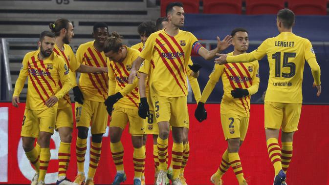Barcelona meraih kemenangan 3-0 atas Ferencvaros pada laga kelima Grup G Liga Champions di Puskas Arena, Kamis (3/12/2020) dini hari WIB. (AP Photo/Laszlo Balogh)