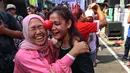 Warga mengikuti kegiatan lomba dalam rangka memeriahkan Hari Ulang Tahun (HUT) ke-78 Republik Indonesia (RI) di kawasan permukiman padat penduduk di Menteng, Jakarta, Kamis (17/8/2023). (Liputan6.com/Angga Yuniar)