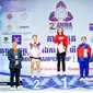 Aprilia Eka Putri berdiri di Podium Juara 2nd Asian Mixed Martial Arts Championship Kelas Traditional MMA Putri -54kg