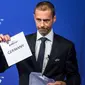 Presiden UEFA, Aleksander Ceferin, mengumumkan Jerman terpilih sebagai tuan rumah Piala Eropa 2024 dalam jajak pendapat yang dilakukan di Nyon, Kamis (27/9/2018). (AFP/Fabrice Coffrini)