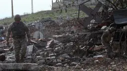 Pada Rabu 11 Desember 2024, militer Israel mengonfirmasi bahwa mereka telah menarik pasukannya dari Khiam di Lebanon selatan, dekat perbatasan dengan Israel, sesuai dengan perjanjian gencatan senjata dengan Hizbullah. (Foto oleh AFP)