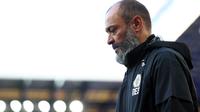 Dalam file foto ini diambil pada 19 Mei 2021, kepala pelatih Wolverhampton Wanderers, Nuno Espirito Santo tiba untuk Liga Premier antara Everton vs Wolves di Goodison Park. Tottenham Hotspur mengumumkan Nuno sebagai pelatih kepala yang baru pada Rabu (30/6/2021) malam WIB. (Jan Kruger/POOL/AFP)