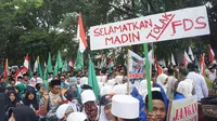 Warga nahdliyin menggelar demo menolak Full Day School di Solo. (Liputan6.com/Fajar Abrori)