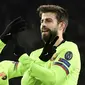 Gerard Pique mencetak gol kedua Barcelona saat melawan PSV (EMMANUEL DUNAND / AFP)