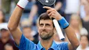Petenis Serbia, Novak Djokovic  melakukan selebrasi seusai mengalahkan Roberto Carballes Baena dari Spanyol pada  babak pertama AS Terbuka 2019 di Billie Jean King National Tennis Center, New York, Senin (26/8/2019). Peringkat satu dunia itu menang 6-4, 6-1, dan 6-4. (AP/Frank Franklin II)