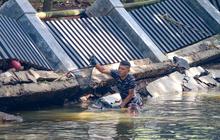 FOTO: TNI AL Bantu  Memusnahkan Ikan Sapu Sapu di Setu babakan
