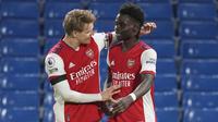Arsenal sukses menaklukkan Chelsea pada laga Liga Inggris 2021/2022 pekan ke-33 yang digelar di Stamford Bridge, Kamis (21/4/2022). Bukayo Saka sukses membawa The Gunners menumbangkan tuan rumah Chelsea dengan skor 4-2. (AP/Frank Augstein)
