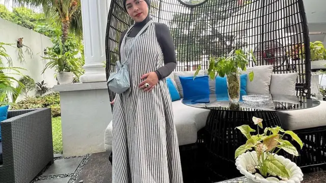 Melly Goeslaw dengan penampilan baru bertubuh langsing
