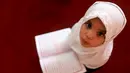 Ekpresi seorang anak saat belajar membaca kitab suci Alquran saat bulan suci Ramadan di sebuah sekolah di Benghazi, Libya, 5 Juli 2015. (REUTERS/Esam Al - Omran Fetori)