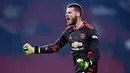 David de Gea - Kiper Setan Merah ini naik ke urutan 10 dalam tabel peraih clean sheet terbanyak di Liga Inggris setelah timnya bermain imbang tanpa gol melawan Watford. Sejauh ini kiper asal Spanyol itu telah mencatatkan 129 clean sheet. (AFP/Laurence GriffithsPool)