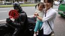 Batman kota Chiba ini tidak memerangi kejahatan, tetapi memberikan kebahagiaan kepada warga agar selalu tersenyum, Jepang, (31/8/14). (REUTERS/Yuya Shino)