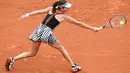 Ana Ivanovic mengenakan kostum bermotif zebra saat berlaga pada Prancis Terbuka 2016 di Roland Garros, Paris, (24/5/2016).  (AFP/Miguel Medina)