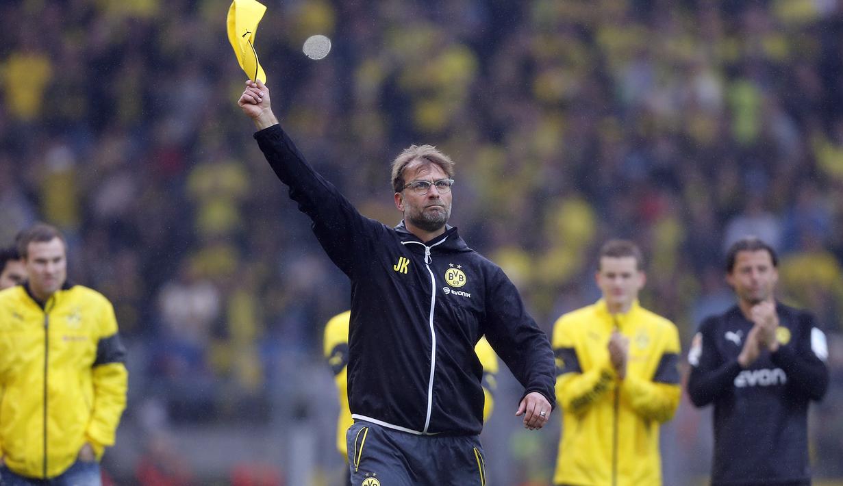 Klopp memutuskan untuk angkat kaki dari Borussia Dortmund di akhir musim ini. Akan tetapi, hingga saat ini tak diketahui kemana Klopp akan melanjutkan keriernya di musim depan. (Frank Augstein/AFP)