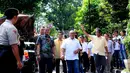 Ketua Umum Partai Golkar Aburizal Bakrie tiba di TPS 32 bersama keluarga besarnya di Menteng, Jakarta Pusat, Rabu (9/4). Foto/Liputan6.com : Andrian Martinus Tunay