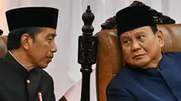 Prabowo Subianto dan Gibran Rakabuming Raka dilantik di Gedung Nusantara MPR/DPR/DPD RI yang disusul dengan pembacaan sumpah jabatan. (BAY ISMOYO/AFP)