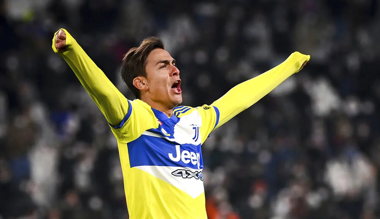 Pemain Juventus Paulo Dybala melakukan selebrasi usai mencetak gol ke gawang Sampdoria pada pertandingan sepak bola babak 16 besar Coppa Italia di Allianz Stadium, Turin, Italia, 18 Januari 2022. Juventus menang 4-1. (Marco Alpozzi/LaPresse via AP)