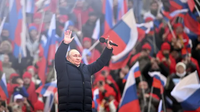 Ekspresi Vladimir Putin saat Perayaan 8 Tahun Rusia Merebut Krimea