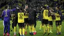 Striker Borussia Dortmund, Erling Braut Haaland, merayakan gol yang dicetaknya ke gawang Paris Saint-Germain pada leg pertama 16 besar Liga Champions di Signal Iduna Park, Dortmund, Rabu (19/2) dini hari WIB. Dortmund menang 2-1 atas PSG. (AFP/Sascha Schuermann)